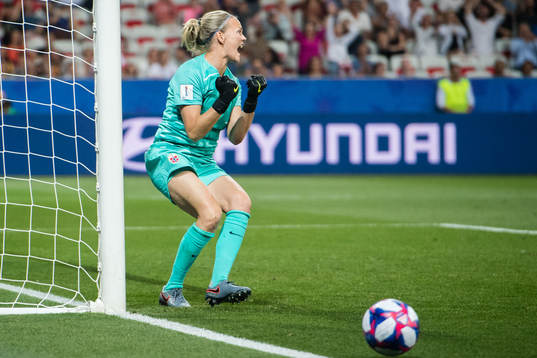 Goalkeeper Ingrid Hjelmseth of Norway celebrates saving