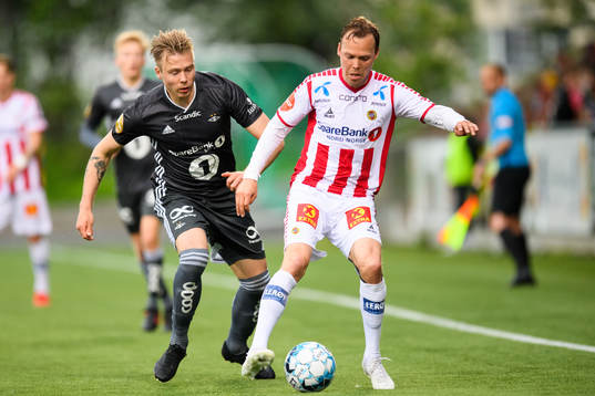 Alexander Søderlund of Rosenborg and Magnus Andersen of Tromsø during the Eliteserien match between Tromsø and Rosenborg on June 23, 2019 in Tromsø.
