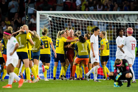 Players of Sweden celebrates winning