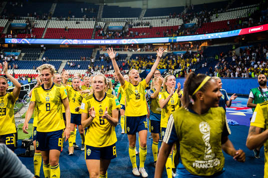 Players of Sweden celebrates winning