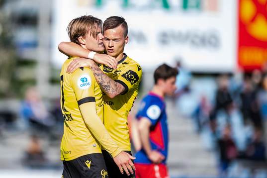 Tobias Christensen and Aron Sigurdarson of Start celebrate after 0-1