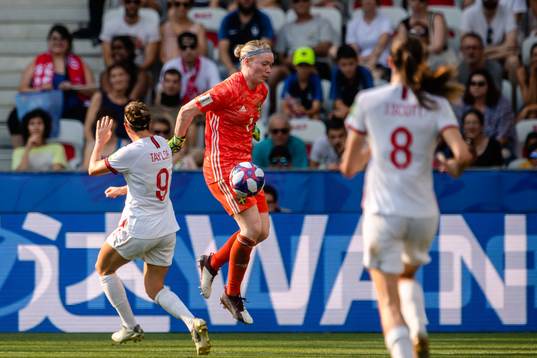 goalkeeper Hedvig Lindahl of Sweden and Jodie Taylor of