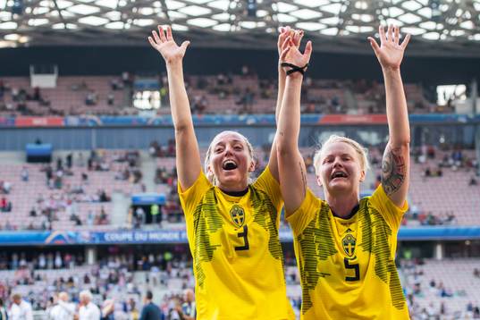Linda Sembrant and Nilla Fischer of Sweden celebrate