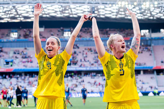 Linda Sembrant and Nilla Fischer of Sweden celebrate