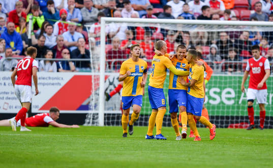 Simon Thern of IFK Norrköping celebrate with teammates