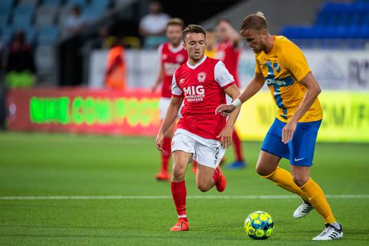 Darragh Markey of St Patrick's and Kasper Larsen of IFK