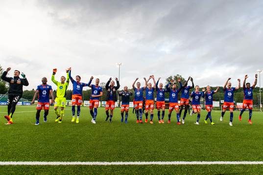 Izunna Uzochukwu, goalkeeper Andreas Lie, Sondre Brunstad Fet, Hólmbert Aron Fridjónsson, Oddbjørn Lie, Jernade Meade, Jonas Grønner, Torbjørn Agdestein, David Kristjan Olafsson, Kaj Ramsteijn, Pape Habib Gueye, Daníel Grétarsson, Jørgen Hatlehol, Aron Elís Thrándarson and Erikson Spinola Lima of Aalesund celebrate after the OBOS-ligaen football match between KFUM and Aalesund on July 21, 2019 in Oslo.
