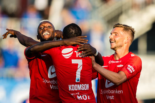 Gilbert Koomson of Brann celebrates after scoring the 0-3 goal with Karamoko Daouda Bamba and Gilli Rolantsson Sørensen of Brann