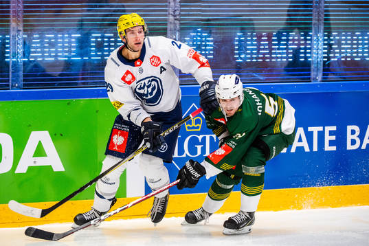 Linus Johansson of Färjestad and Michael Fora of