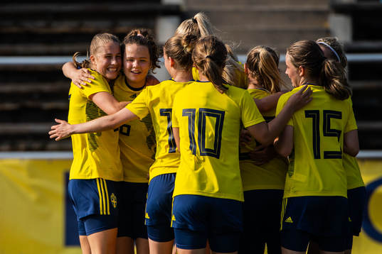  Johanna Alm and Julia Walentowicz of Sweden  celebrate with teammates after 1-1 during the women's