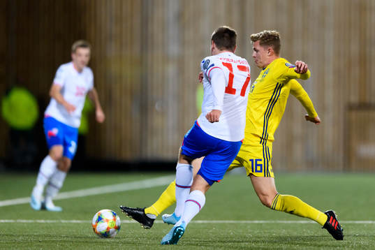 Arni Frederiksberg of Faroe Islands and Emil Krafth of