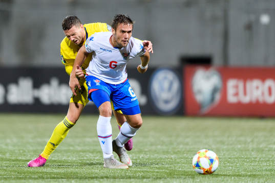 Marcus Berg of Sweden in a situation with Jakob Johansson of Sweden