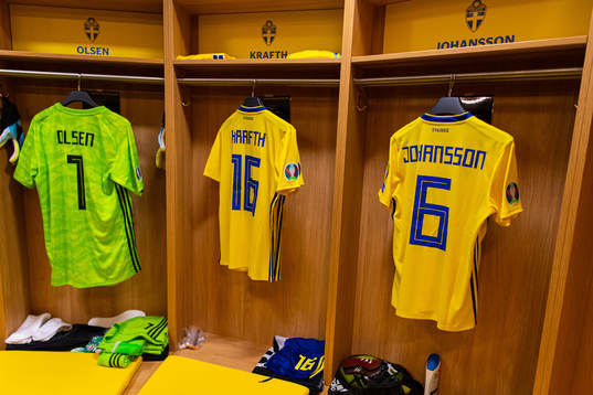 Jerseys of Robin Olsen, Emil Krafth and Jakob Johansson in the Swedish dressing room ahead of the UEFA Euro Qualifier football match between Sweden and Norway on September 8, 2019 in Stockholm.