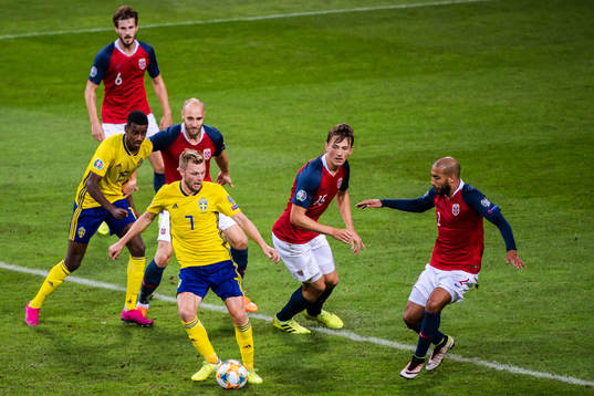 Alexander Isak and Sebastian Larsson of Sweden against Håvard Nordtveit, Tore Reginiussen and Sander Berge of Norway during the UEFA Euro Qualifier football match between Sweden and Norway on September 8, 2019 in Stockholm.
