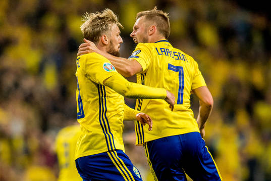 Emil Forsberg of Sweden celebrates with teammate Sebastian