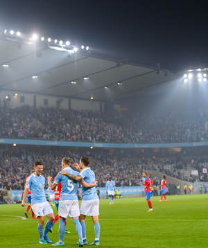 Malmö FFs Sören Rieks jublar med Marcus Antonsson och