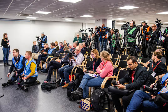 Journalists prepare their cameras