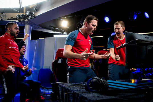 Arkan Resul, Mats Theie Bretvik, Andreas Bakken and Anders Rasmussen of Norway celebrate