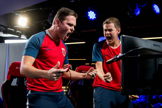 Andreas Bakken and Anders Rasmussen of Norway celebrate