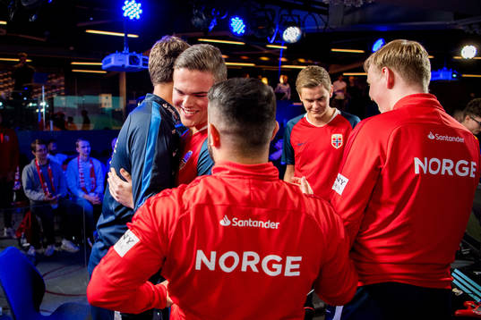 Andreas Bakken of Norway celebrates with teammates