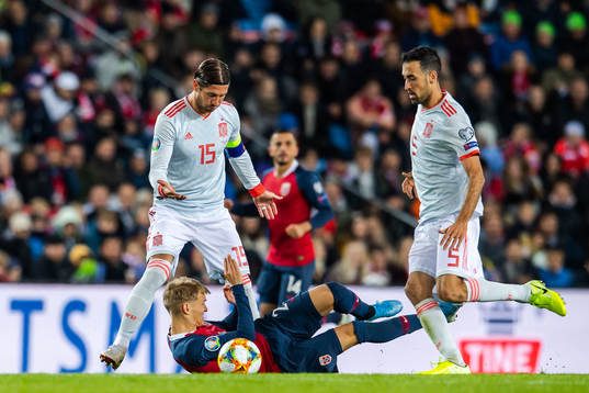 Sergio Ramos and Sergio Busquets of Spain against Martin