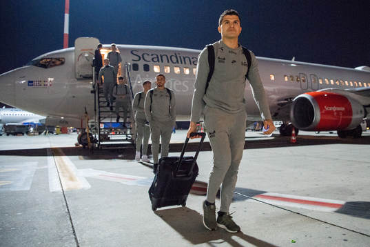 Tarik Elyounoussi of Norway arrives at Henri Coanda