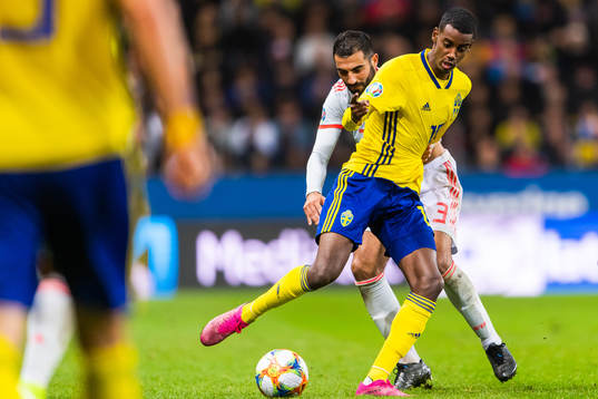 Raul Albiol of Spain and Alexander Isak of Sweden