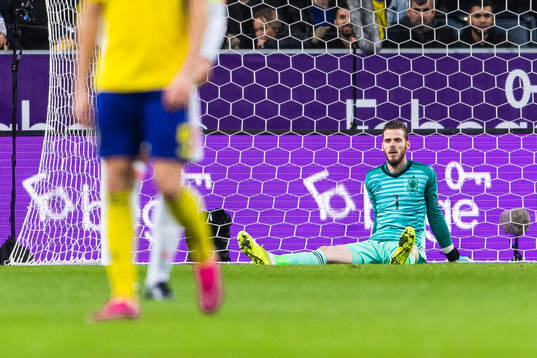 Goalkeeper David de Gea of Spain sits down
