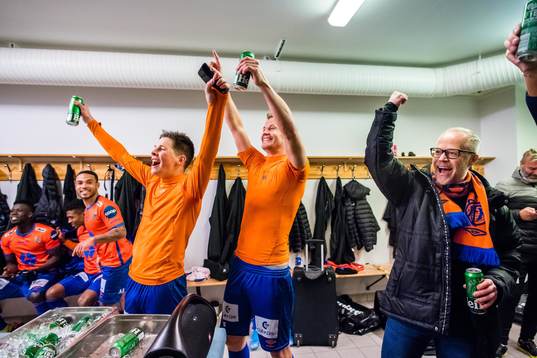 Sondre Brunstad Fet, Ståle Stålinho Sæthre of Aalesund and Geir Steinar Vik, managing director of Aalesund, celebrates promotion to the Eliteserien