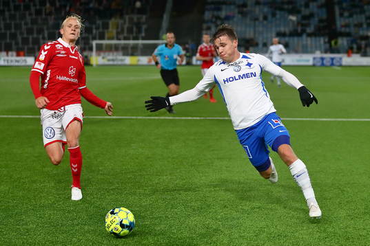 Kalmars Henrik Löfkvist och IFK Norrköpings Simon Skrabb