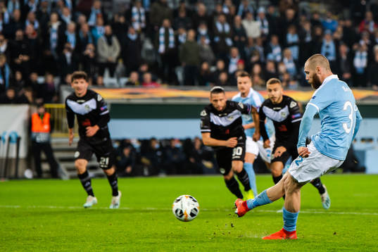 Jo Inge Berget of Malmö FF scores 1-0