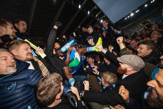 Djurgården’s Mohamed Buya Turay celebrates with fans