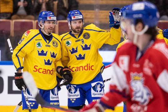 Mikael Wikstrand of Sweden cheering with Anton Rödin of