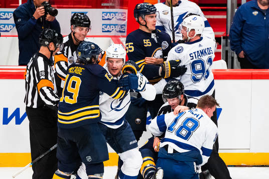 Jake McCabe, Jeff Skinner and Rasmus Ristolainen of Buffalo