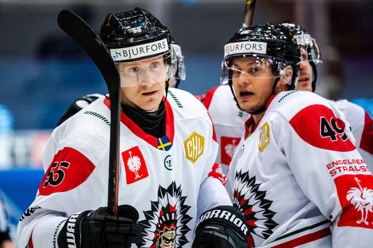 David Printz and Rhett Rakshani of Frölunda celebrate