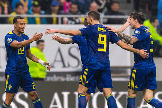 Robin Quaison of Sweden celebrates with Sebastian Larsson,