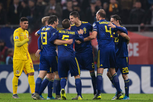 Gustav Svensson, Pierre Bengtsson, Mikael Lustig, Andreas Granqvist and Kristoffer Olsson of Sweden celebrate