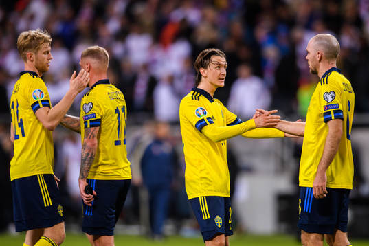 Filip Helander, John Guidetti, Kristoffer Olsson and Marcus Danielson of Sweden celebrate