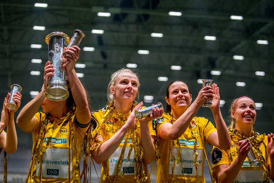 Ina Gausdal, Isabell Bachor and Therese Sessy Åsland of LSK Kvinner celebrate