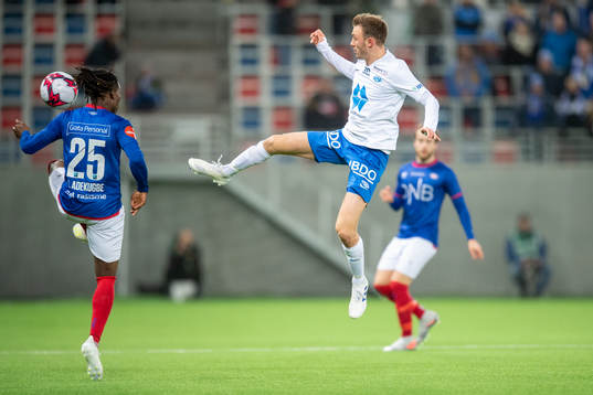 Sam Adekugbe of Vålerenga and Fredrik Aursnes of Molde
