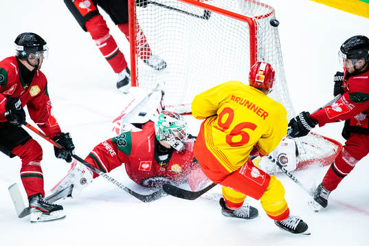 Damien Brunner of Biel-Bienne against goalkeeper Johan