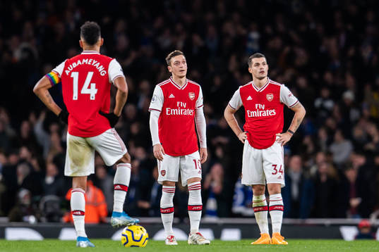 Mesut Özil and Granit Xhaka of Arsenal looks dejected