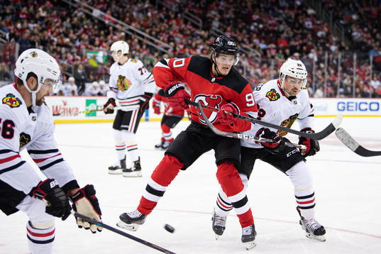 New Jersey Devils Jesper Boqvist and Chicago Blackhawks