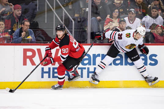 New Jersey Devils Jesper Boqvist and Chicago Blackhawks