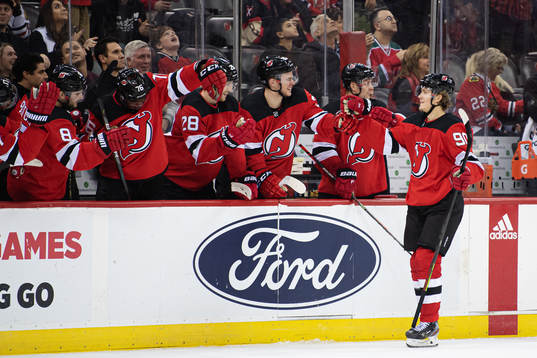 New Jersey Devils Jesper Boqvist celebrates with teammates