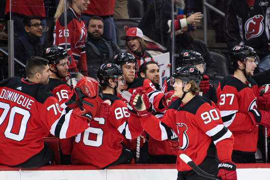 New Jersey Devils Jesper Boqvist celebrates with teammates