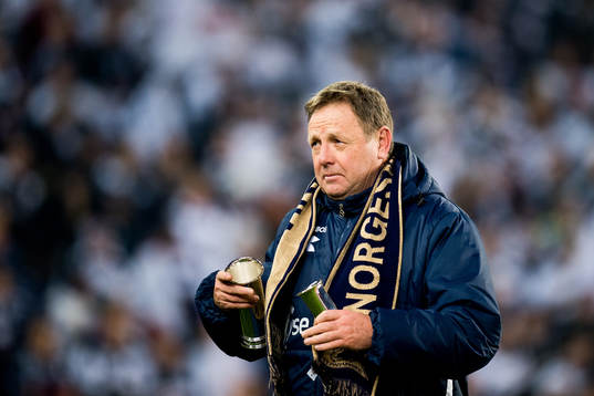 Bjarne Berntsen, head coach of Viking, celebrates with the trophy
