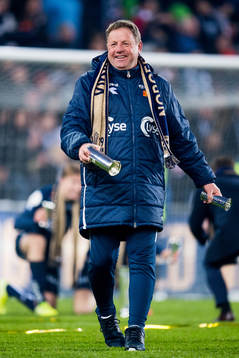 Bjarne Berntsen, head coach of Viking, celebrates with the trophy