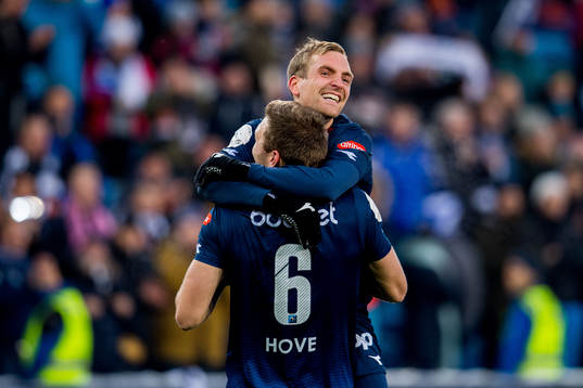 Kristoffer Løkberg and Runar Ullaland Hove of Viking celebrate