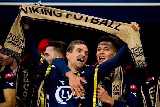 Kristoffer Løkberg and Adrian Pereira of Viking celebrate